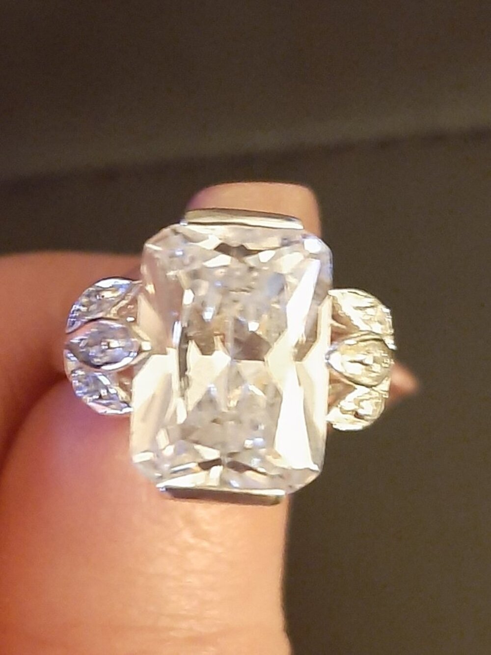 4 Carat Emerald-cut Sterling silver CZ ring w/ CZ petal detail